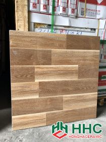Gạch lát nền 60x60 bóng kiếng vân gỗ nâu vàng