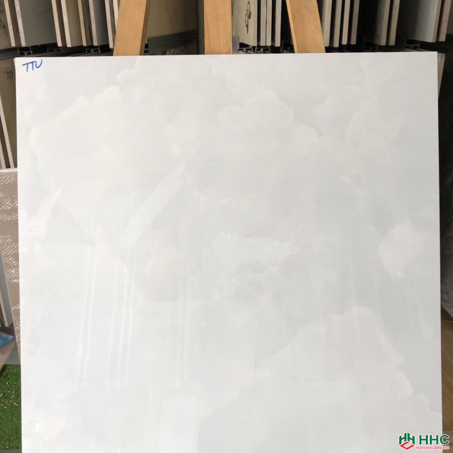 Gạch 60x60 lát nền phòng khách trắng vân mây HHTTV25